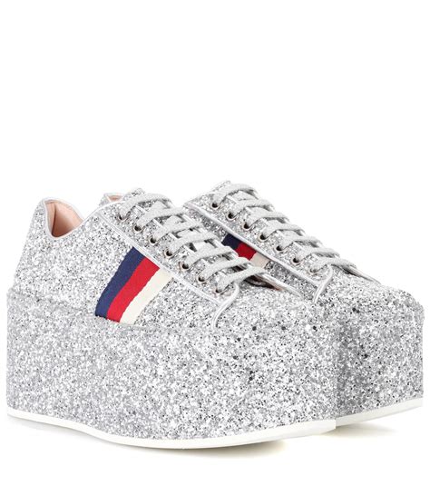 glitter platform sneakers.